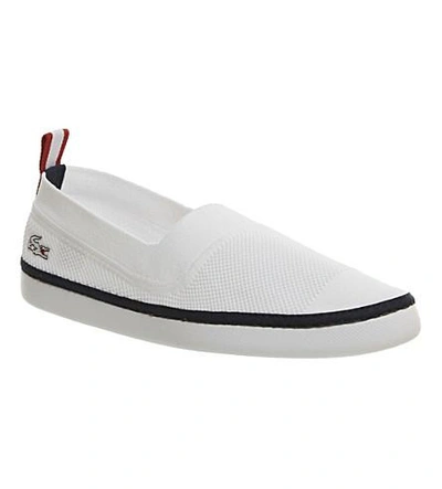 Shop Lacoste L.ydro Canvas Sneakers In White
