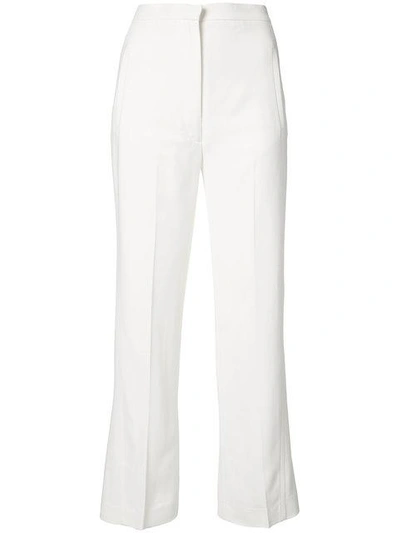 Shop Khaite Cropped Trousers In White