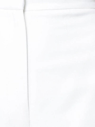 Shop Khaite Cropped Trousers In White
