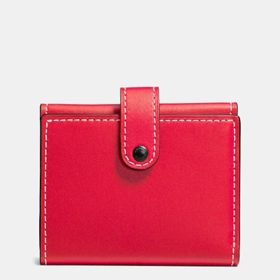Coach Small Trifold Wallet In Glovetanned Leather In Black Copper/vermillion
