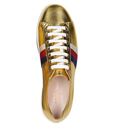 Shop Gucci Peggy Leather Platform Trainers In Gold