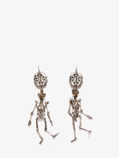 Shop Alexander Mcqueen “queen And King" Skeleton Earrings In Gold/silver 
