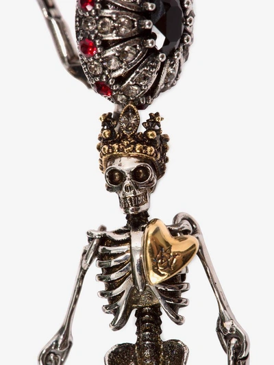 Shop Alexander Mcqueen “queen And King" Skeleton Earrings In Gold/silver 