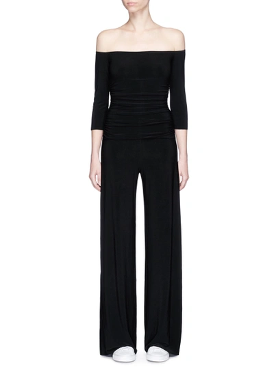 Shop Norma Kamali Ruched Off-shoulder Jumpsuit