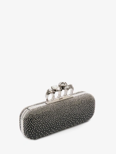 Shop Alexander Mcqueen Studded Four Ring Clutch In Black