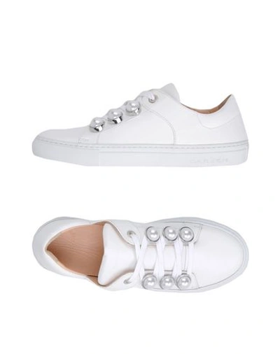 Shop Carven Sneakers In White