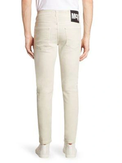 Shop Mcq By Alexander Mcqueen Swallow Strummer Jeans In Optic White