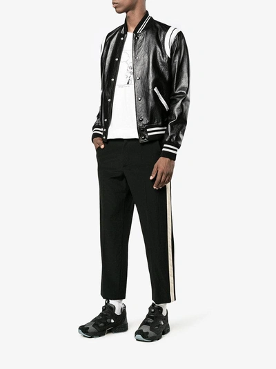 Shop Saint Laurent Stripe Leather Varsity Jacket In Black