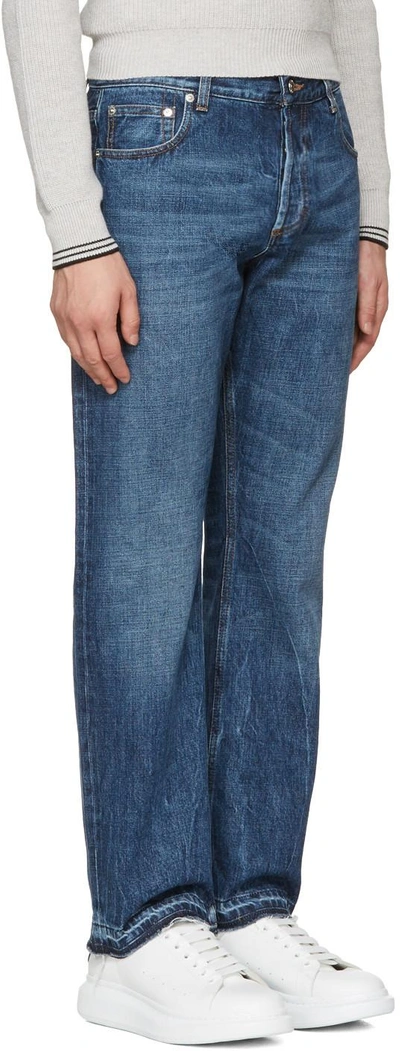 Shop Alexander Mcqueen Indigo Slit Hem Jeans In 4001 - Indigo Stonew