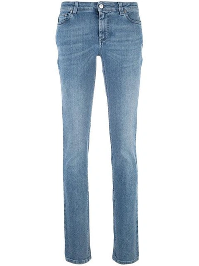 Shop Givenchy Star Patch Skinny Jeans In Blue