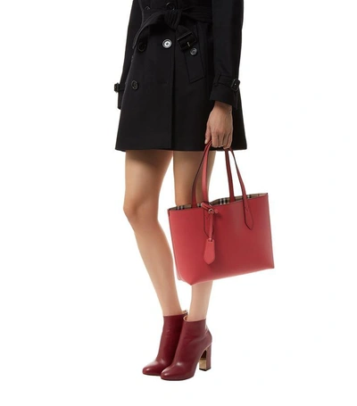 Shop Burberry Small Reversible Tote Bag In Red