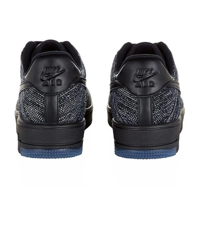 Shop Nike Air Force 1 Flyknit Low Sneakers In Black