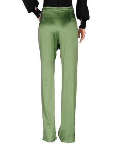 Shop Capucci Casual Pants In Green