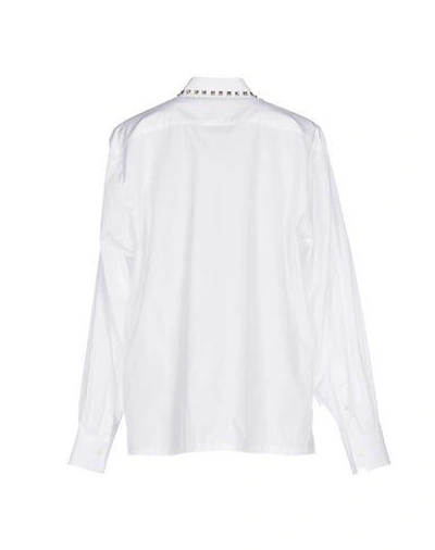 Shop Valentino Solid Color Shirts & Blouses In White