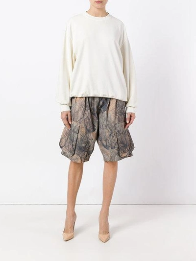 Shop Yeezy Camo Print Cargo Shorts - Brown