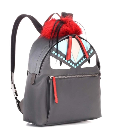 Fur and leather embellished backpack