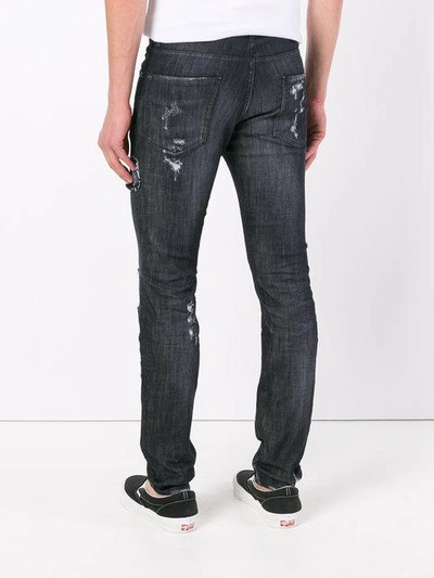 Shop Dsquared2 Distressed Skinny Jeans - Black