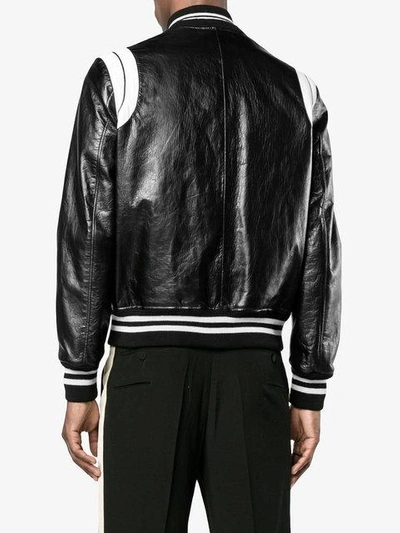 Shop Saint Laurent Stripe Leather Varsity Jacket - Black