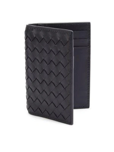 Shop Bottega Veneta Eight-slot Leather Cardholder In Black