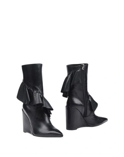 Shop Jw Anderson Ankle Boot In Black
