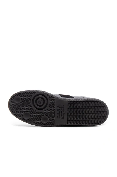 Maison Margiela Low Top Sneakers Featuring Suede Panels In Black