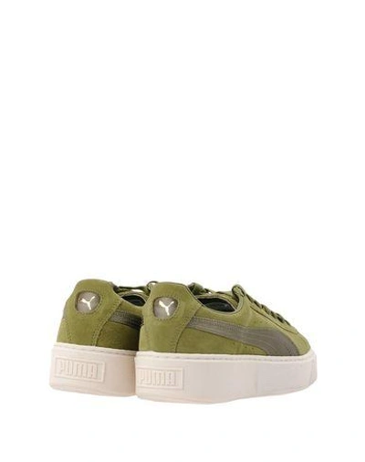 Puma Suede Trainers In Green | ModeSens