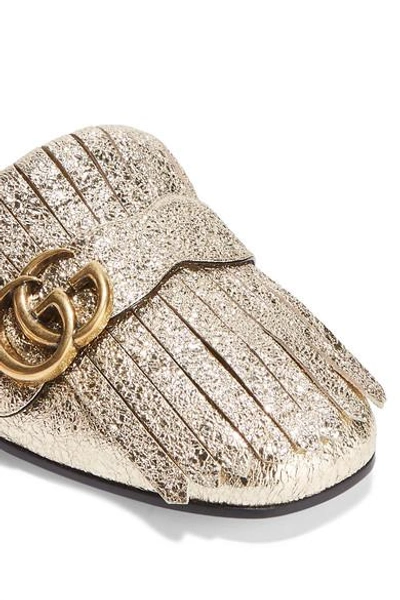 Shop Gucci Marmont Fringed Logo-embellished Metallic Cracked-leather Slippers In Gold