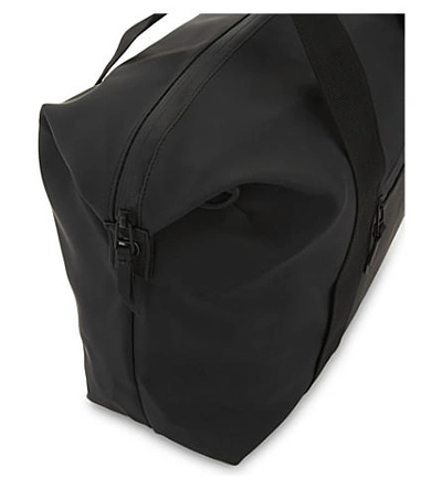 Shop Rains Zipped Duffel Bag In Black