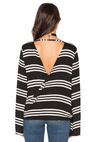 Shop Chaser Bell Sleeve Surplice Top In Black