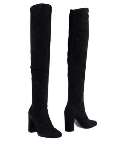 Shop Saint Laurent Boots In Black