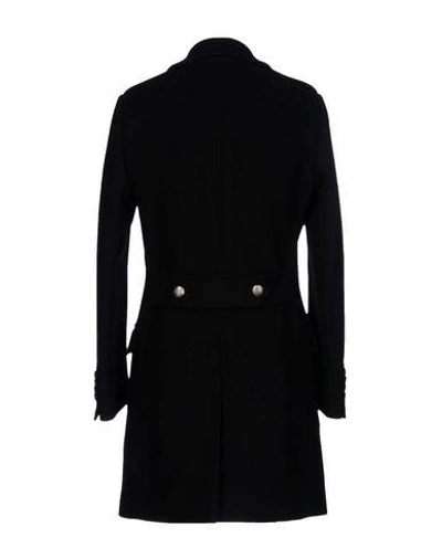 Shop Dolce & Gabbana Coats In Black