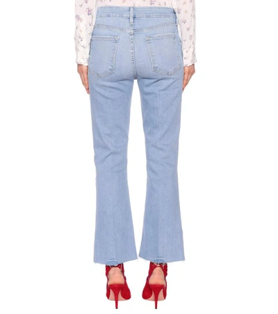 Shop Frame Le Crop Mini Boot Jeans In Blue