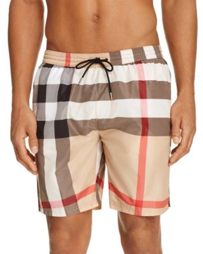 Shop Burberry Gowers Check Swim Trunks In Camel