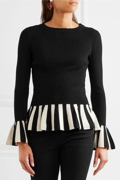 Shop Boutique Moschino Striped Knitted Sweater In Black