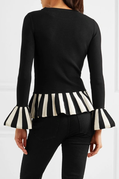 Shop Boutique Moschino Striped Knitted Sweater In Black