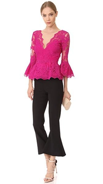 Shop Marchesa Peplum Top With Plunging V Neck In Fuchsia