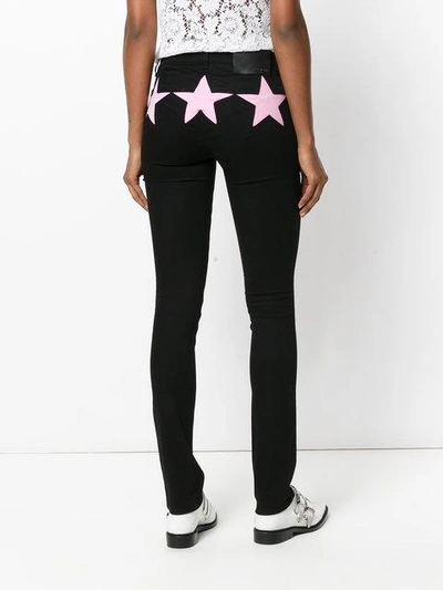 Shop Givenchy Star Motif Skinny Jeans In Black