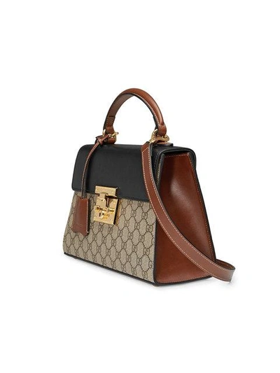 Shop Gucci Padlock Gg Supreme Top Handle Bag In Neutrals