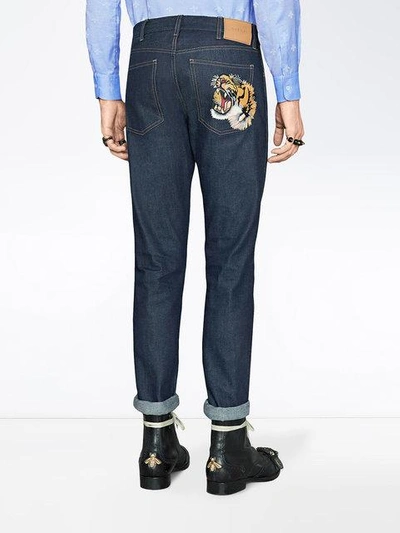 Shop Gucci Stretch Denim Slim Pant With Tiger In Blue