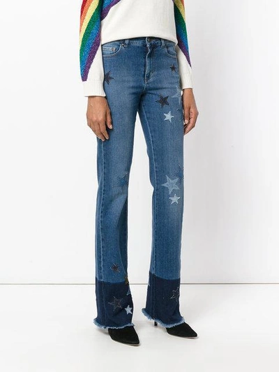 Shop Red Valentino Star Patch Flared Jeans In Blue