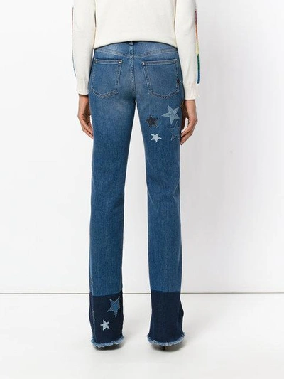 Shop Red Valentino Star Patch Flared Jeans In Blue