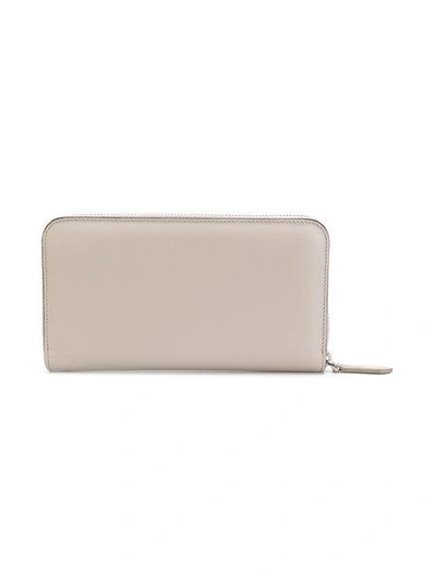 Shop Fendi Embellished Zip-around Wallet - Neutrals