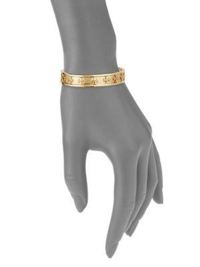 Tory Burch Raised Logo Cuff Bracelet In Silvertone Brass In Metallic Gold |  ModeSens