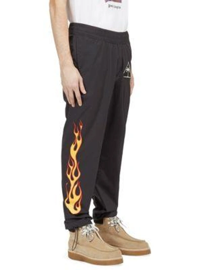 Shop Palm Angels Palms And Flames Sporty Pants In Black