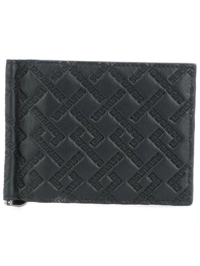 Shop Versace Embossed Greek Key Cardholder In Black