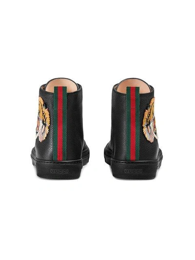 Shop Gucci Hoher Sneaker Aus Leder Mit Tigermotiv In 1060 Nero