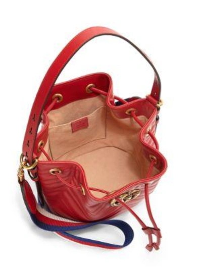 Shop Gucci Gg Marmont Chevron Quilted Leather Bucket Bag In Red