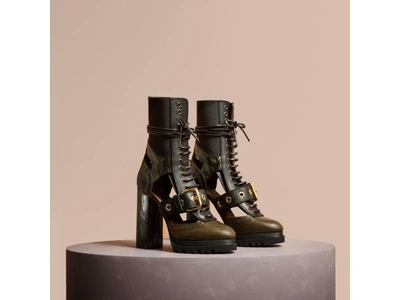 Shop Burberry Buckle Detail Leather And Snakeskin Cut-out Ankle Boots In Military Olive