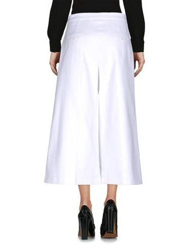 Shop Neil Barrett Cropped Pants & Culottes In White