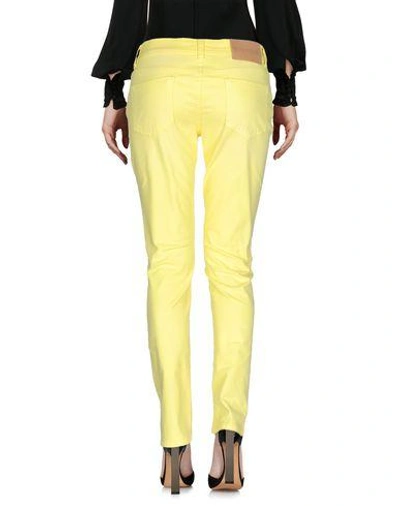Shop Pierre Balmain Casual Pants In Yellow